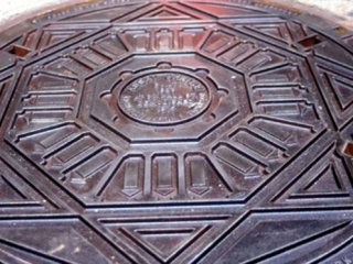 Recovering the Cityscape: Assay Office Manhole Cover
